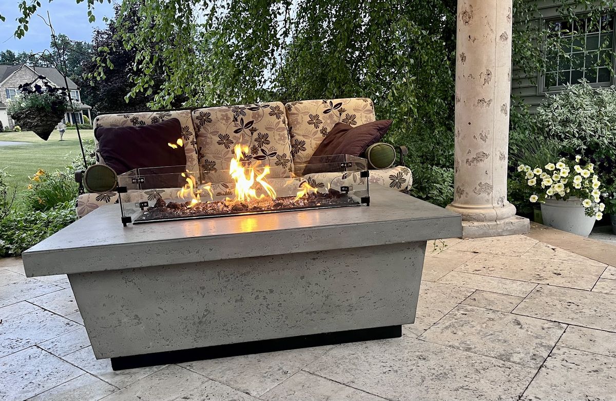 Concrete fire table on patio