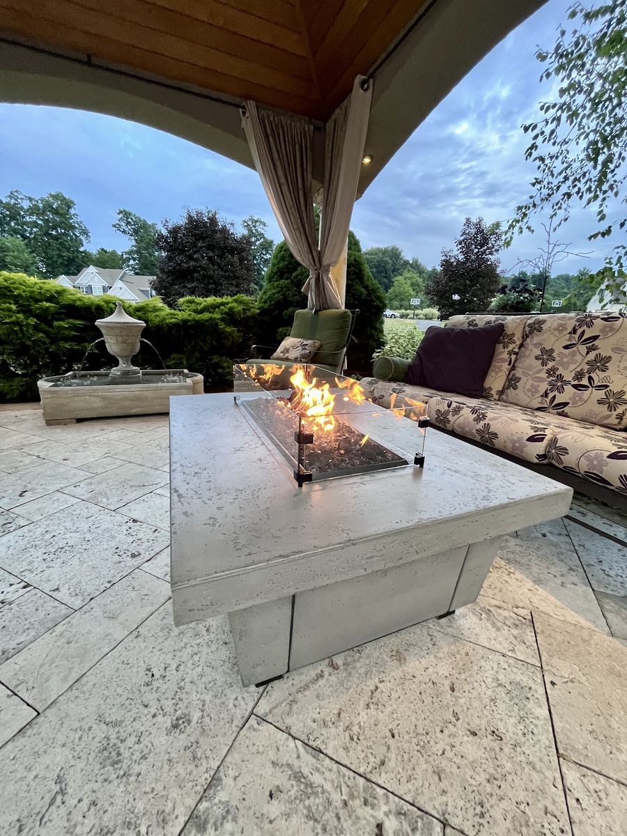 Concrete fire table on patio